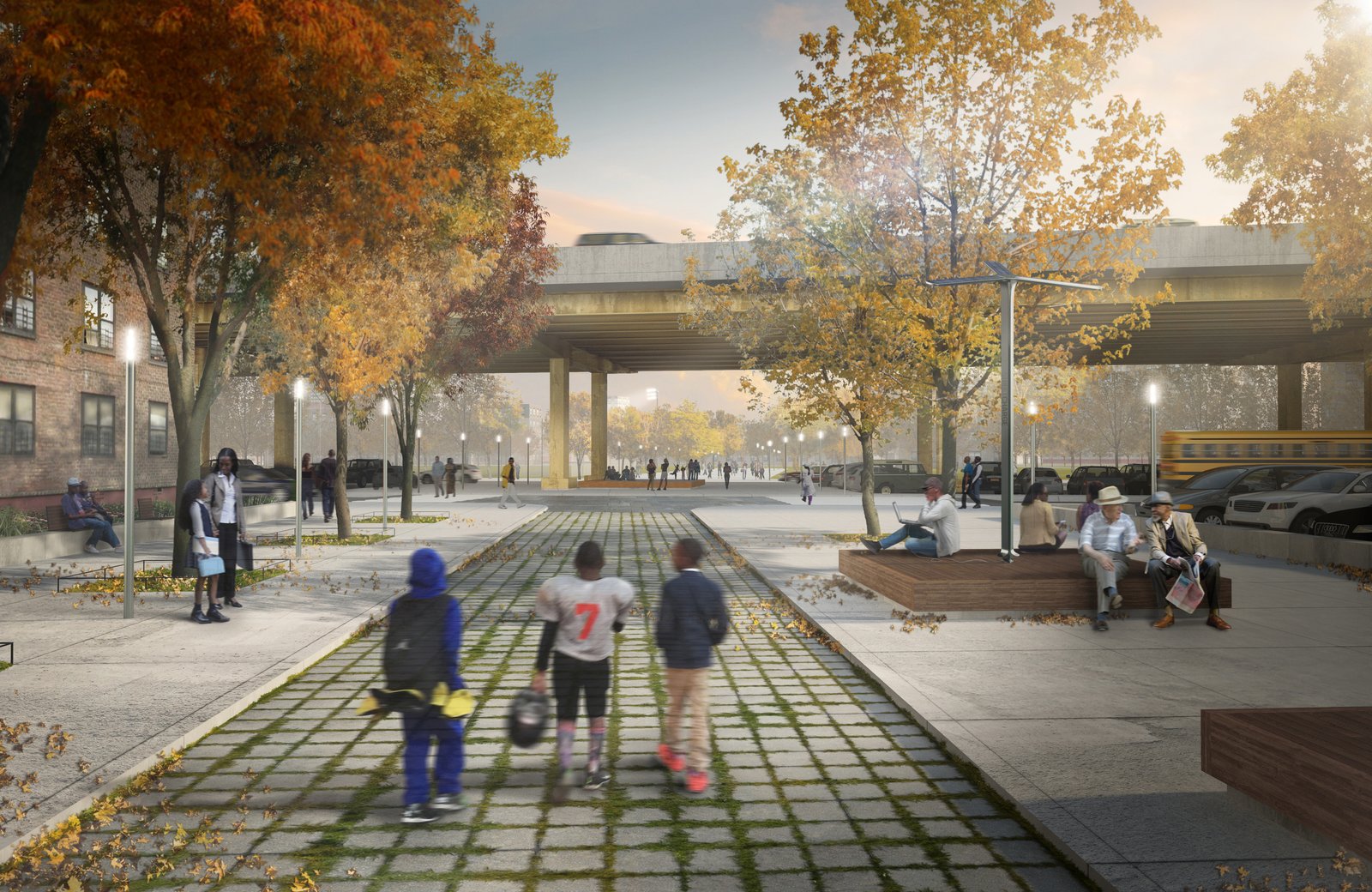 Tree-lined walkway at Park Avenue Crossing with seating and gathering spaces.