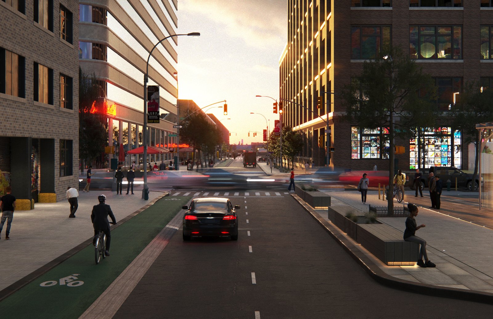 Urban street scene with cars, cyclists, and pedestrians at sunset.