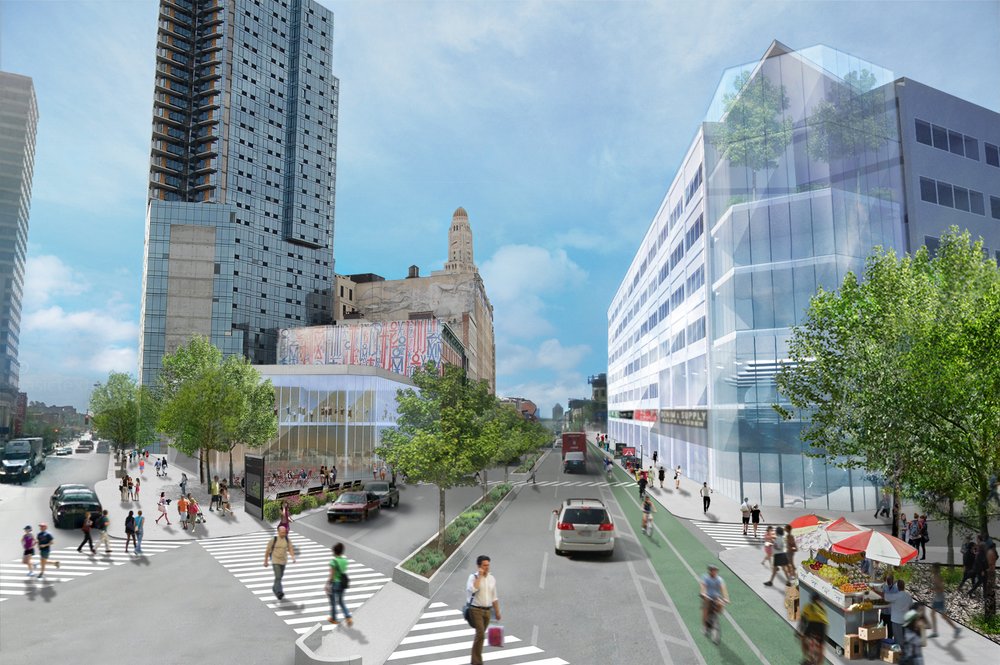 Street-level view of a bustling urban area with pedestrians, cyclists, and modern buildings.