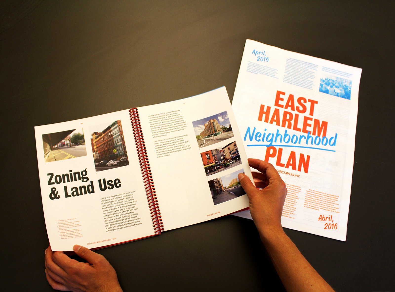 Hands holding East Harlem Neighborhood Plan and zoning document.