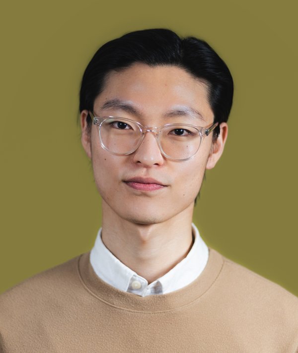 Headshot of James Kwon against a green background.