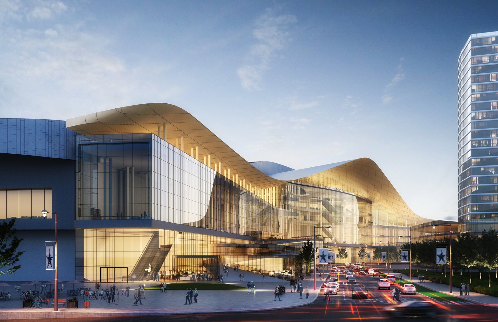 Exterior view of modern convention center with curved roof and large glass facade.