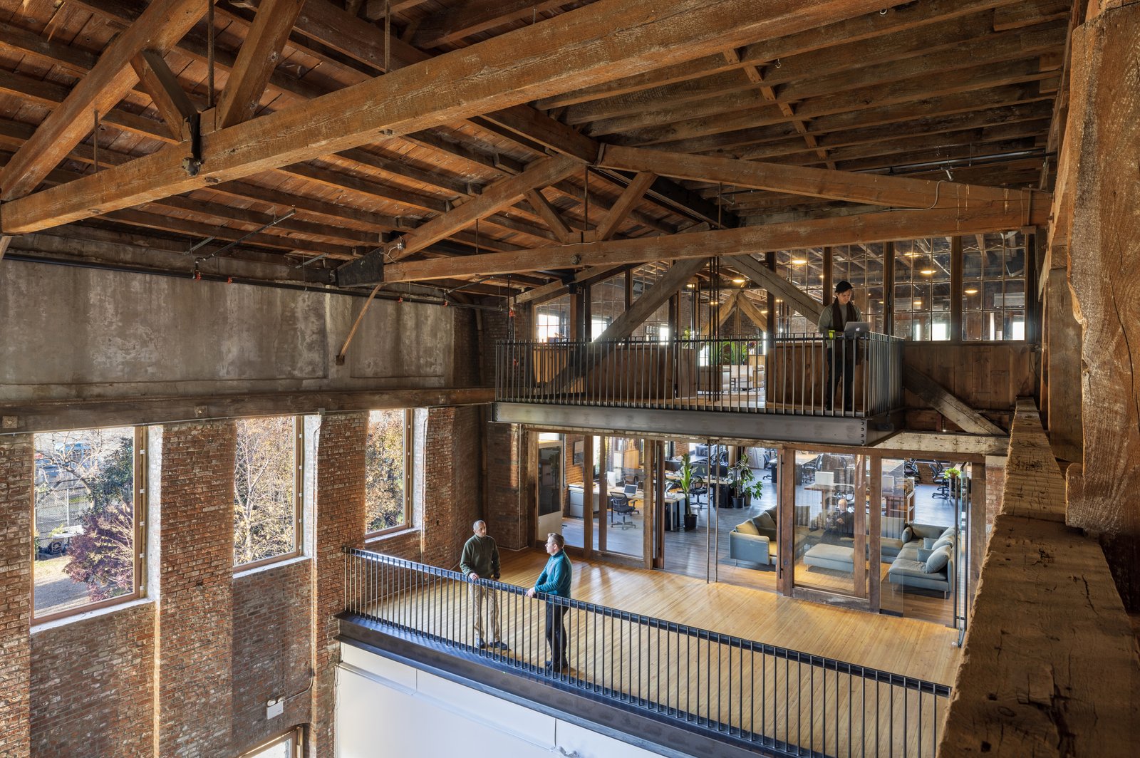 The view from upper walkway to both both timber balconies.