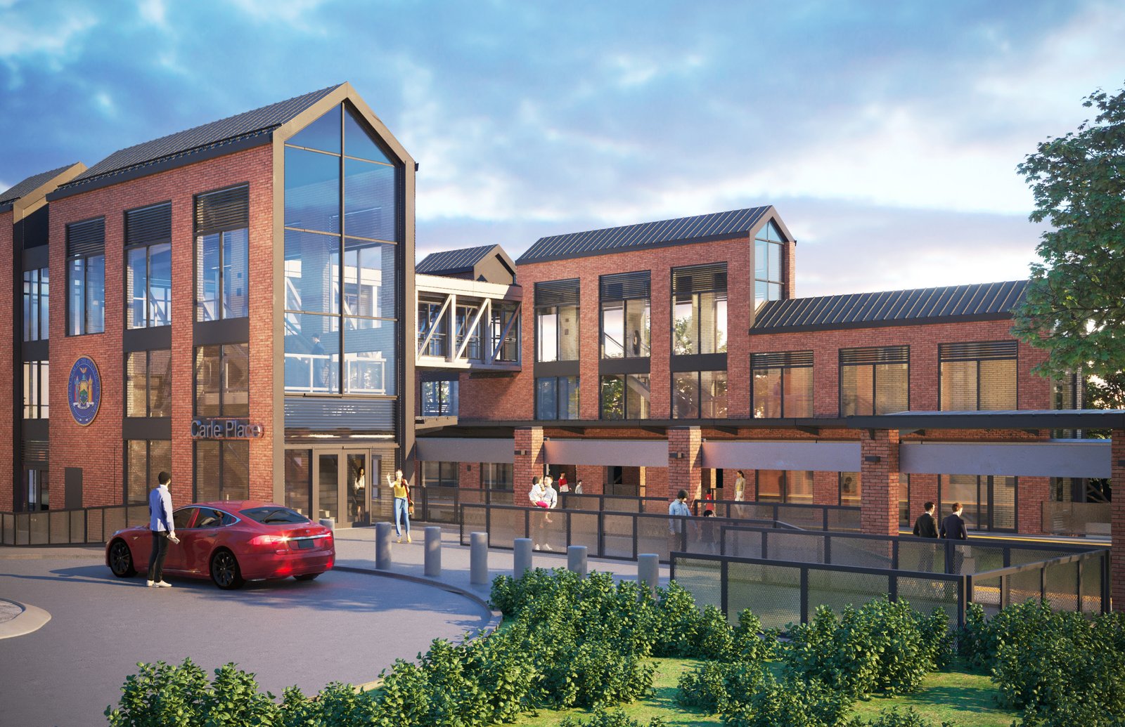 Train station with brick facade and glass atrium.