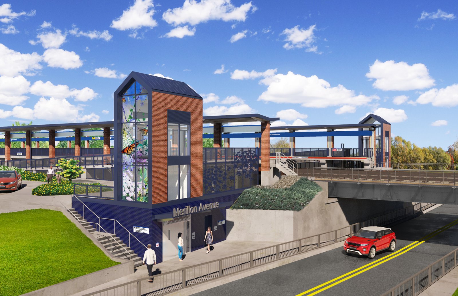 Train station with decorative glass elevator and brick facade.