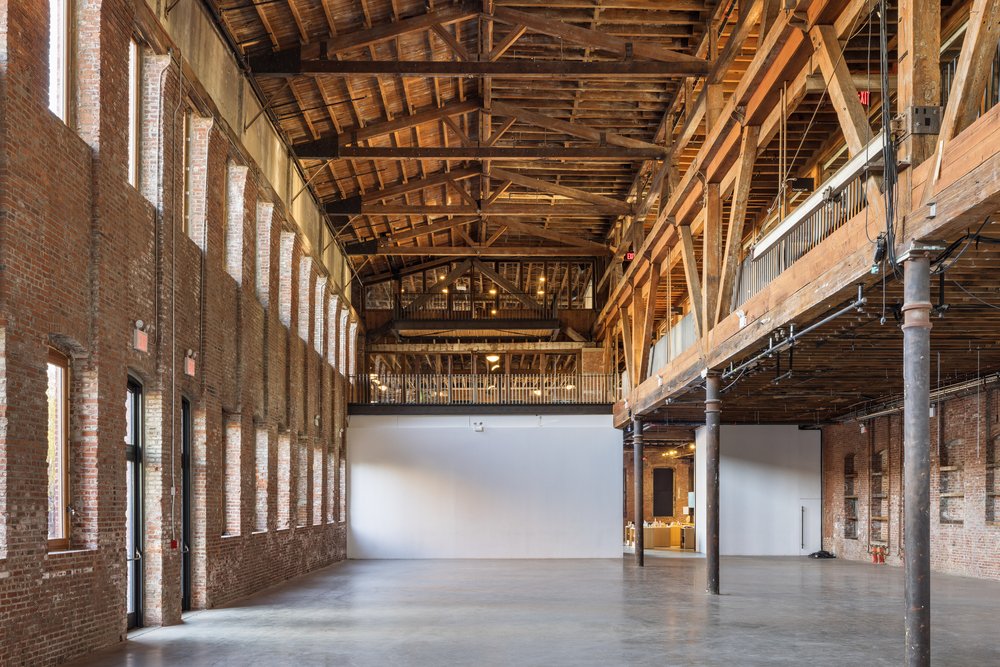 A view of the main space with new railings and accessible balconies.