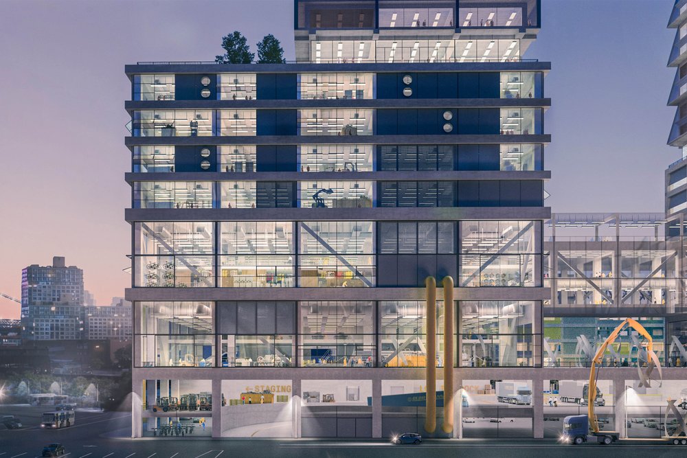 Close-up view of a multi-story building at Brooklyn Navy Yard, showing interior workspaces.