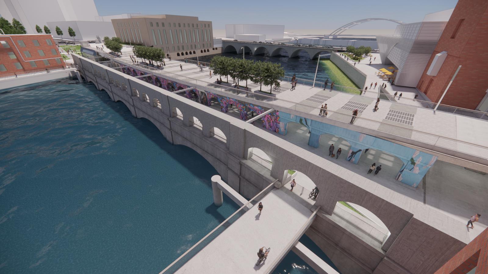 Aerial view of the aqueduct, featuring pedestrian walkways, greenery, and vibrant murals.