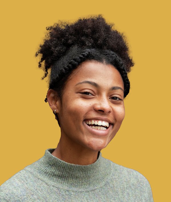 Headshot of Mallory Thatch against a yellow background.