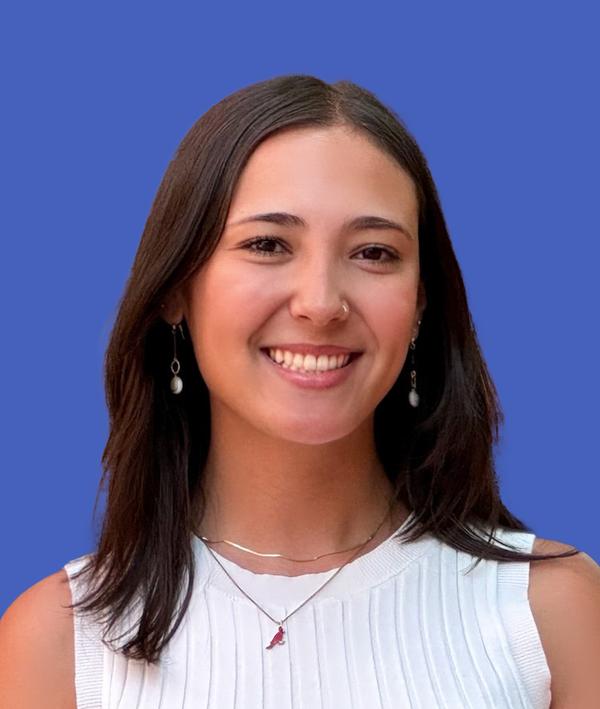 Headshot of Jessica Wong in a white top against a blue background.