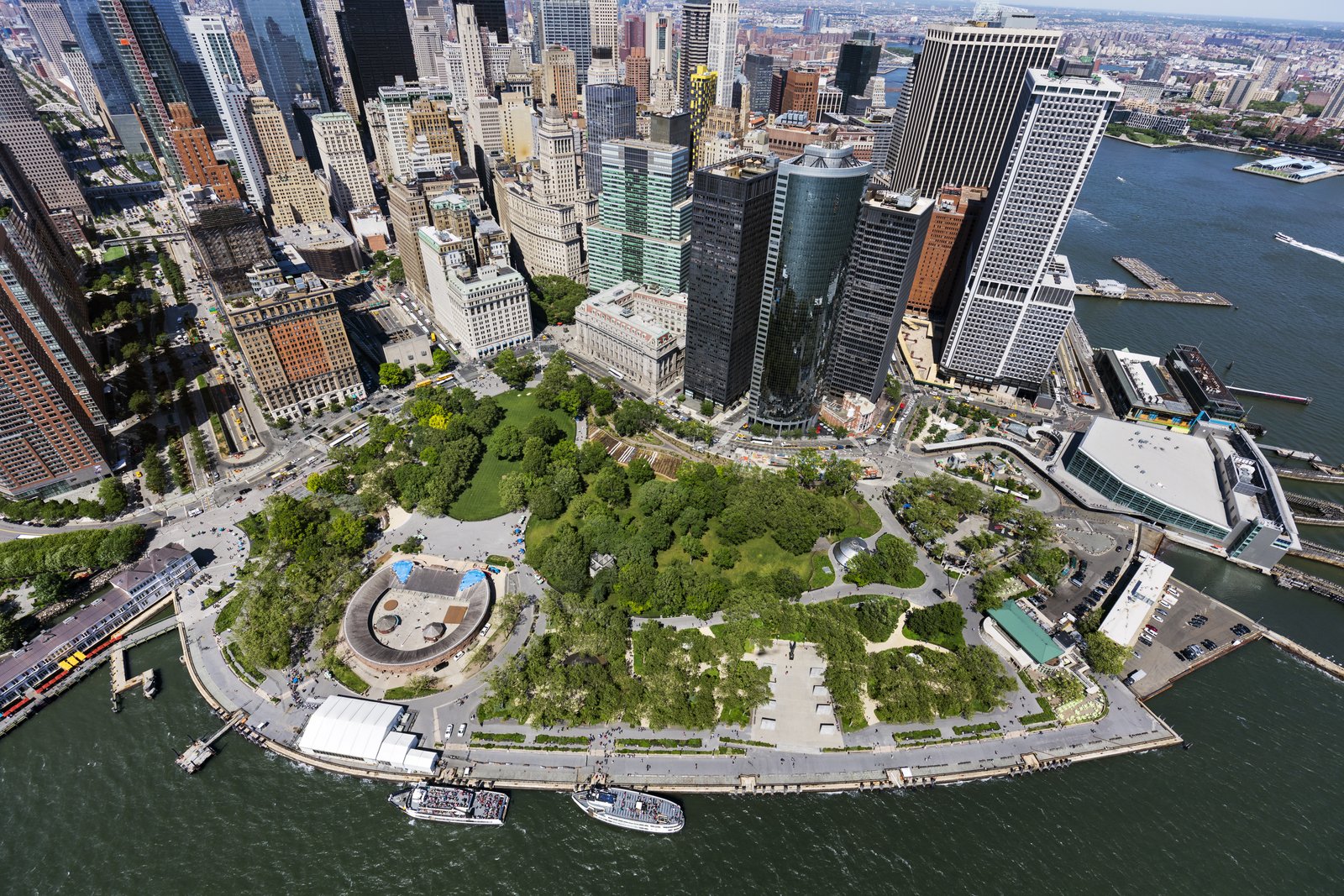 Aerial view of The Battery in 2016 shows the green park juxtaposed with the high-rise buildings.