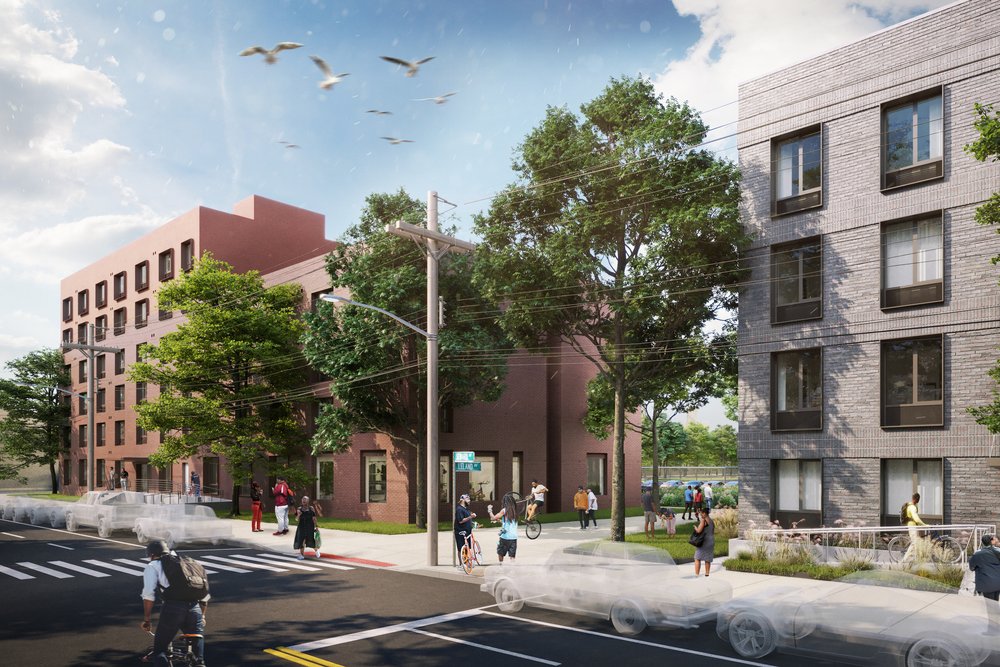 View of a tree-lined urban street with mid-rise brick and stucco buildings and active pedestrian spaces.